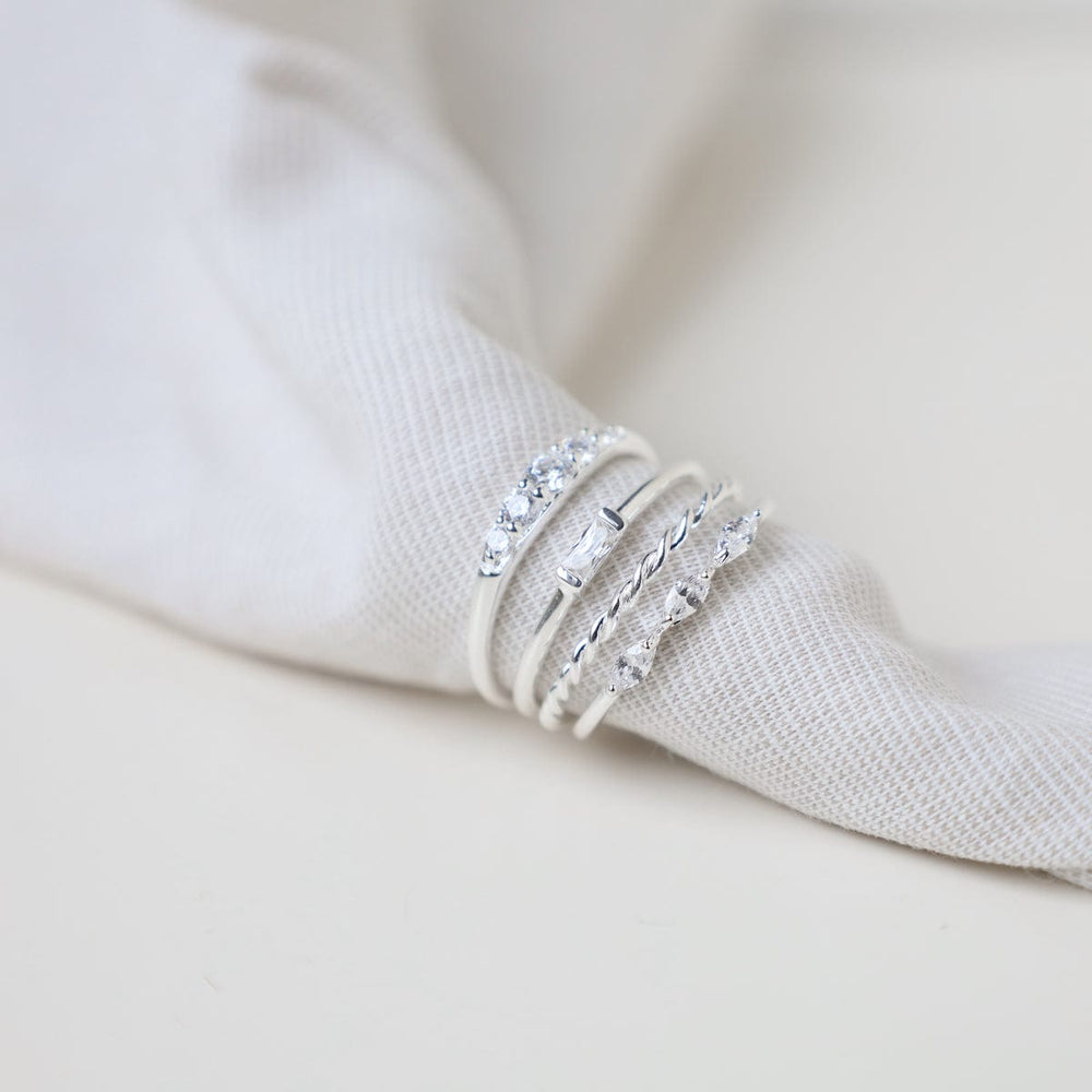 
                  
                    RNG Sterling Silver Band with Channel Set CZ Baguette Ring
                  
                