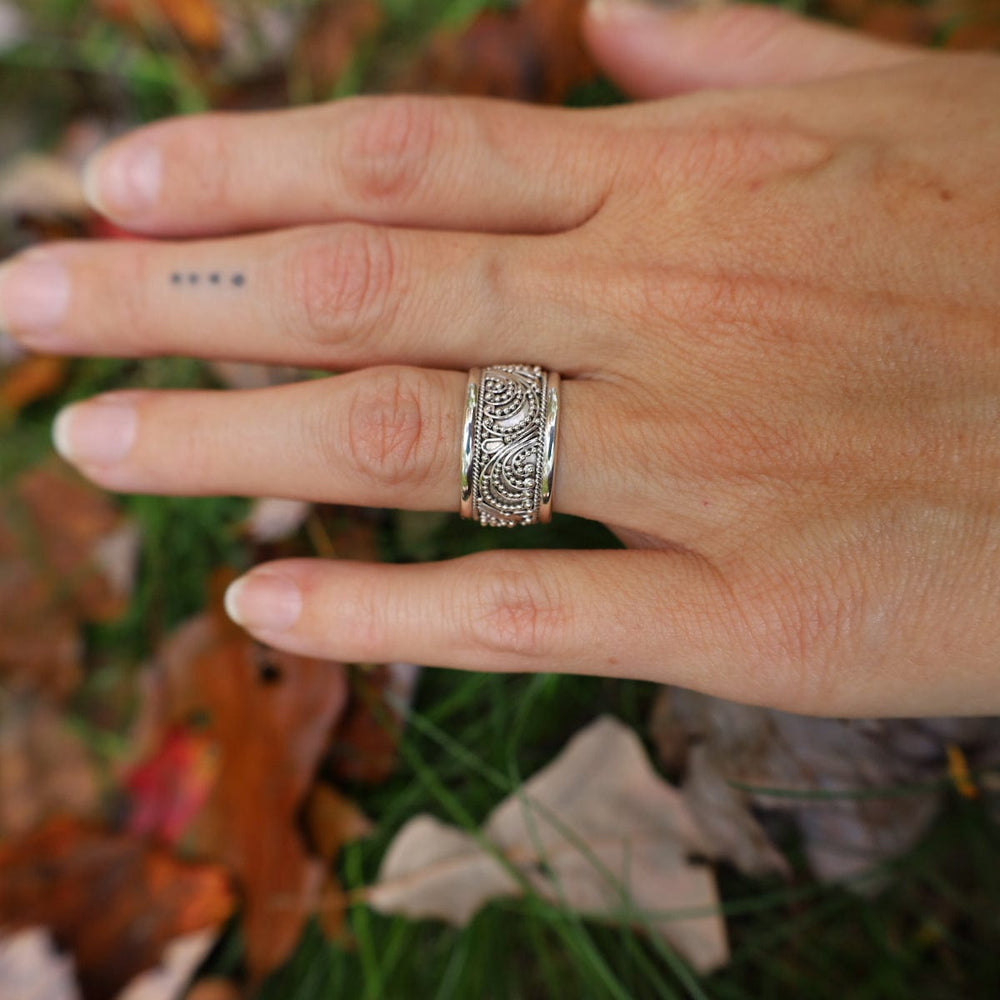 
                  
                    RNG Sterling Silver Beaded Swirls Ring
                  
                