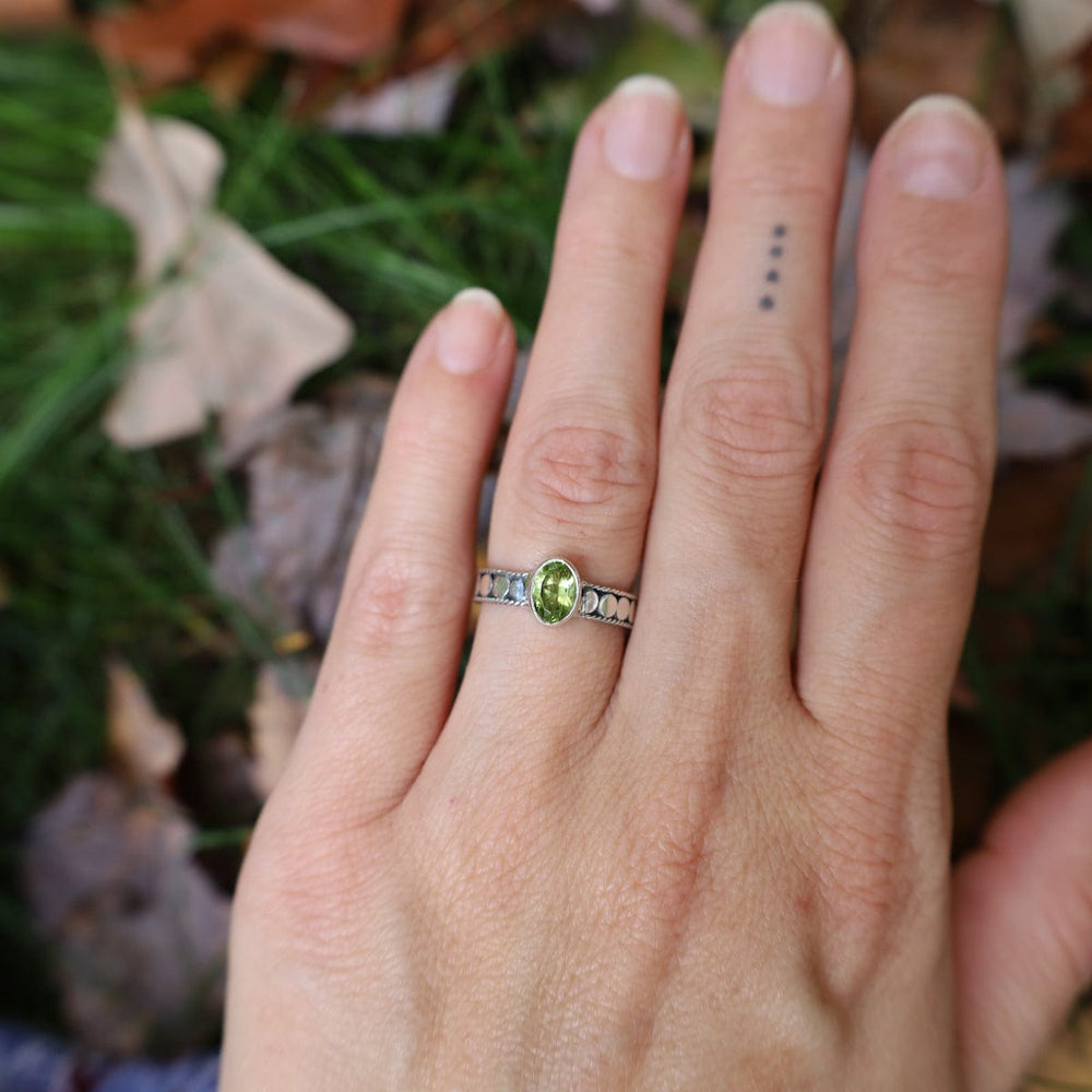 
                  
                    RNG Sterling Silver Dot Band with Peridot
                  
                