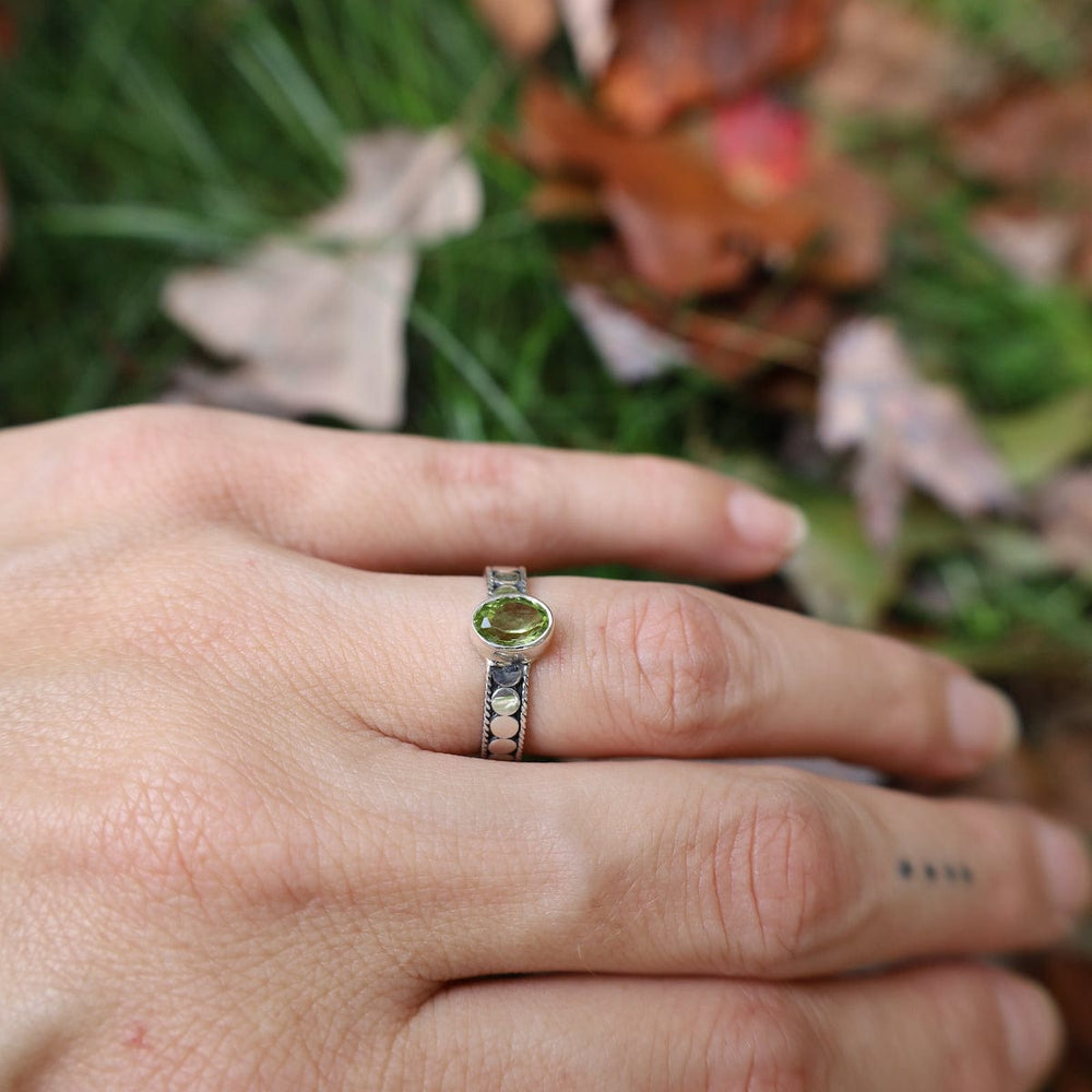 
                  
                    RNG Sterling Silver Dot Band with Peridot
                  
                