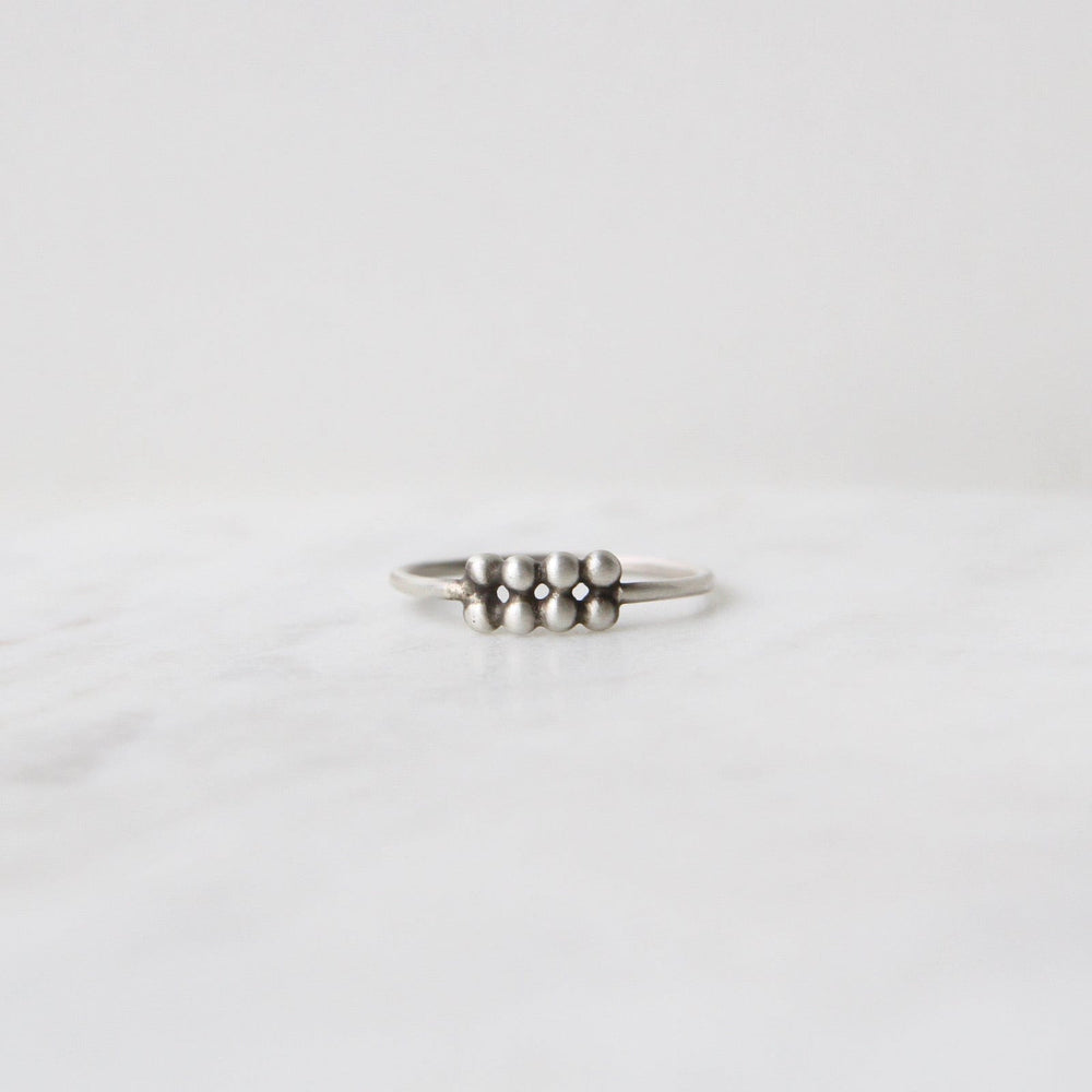 
                      
                        RNG Sterling Silver Eight Granulated Ball Stacking Ring
                      
                    