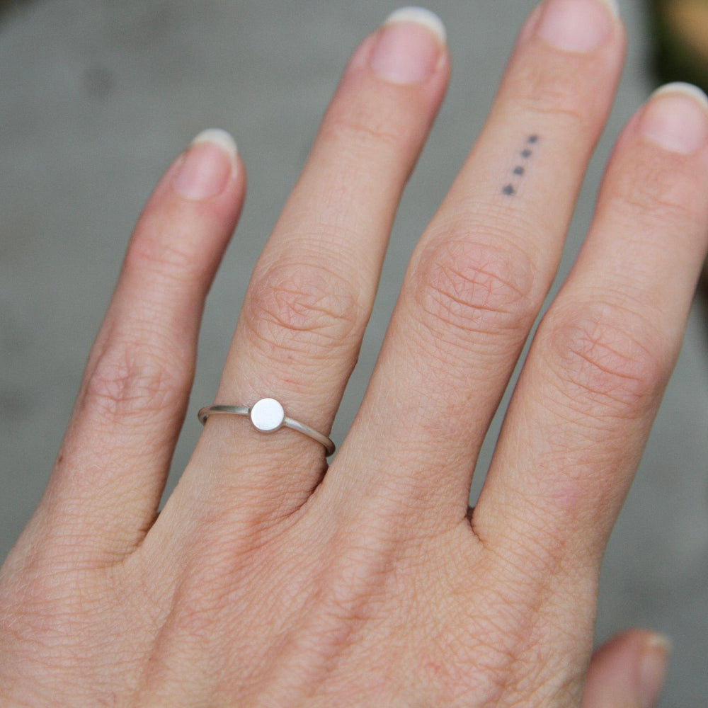 
                      
                        RNG Sterling Silver Little Disc Ring
                      
                    