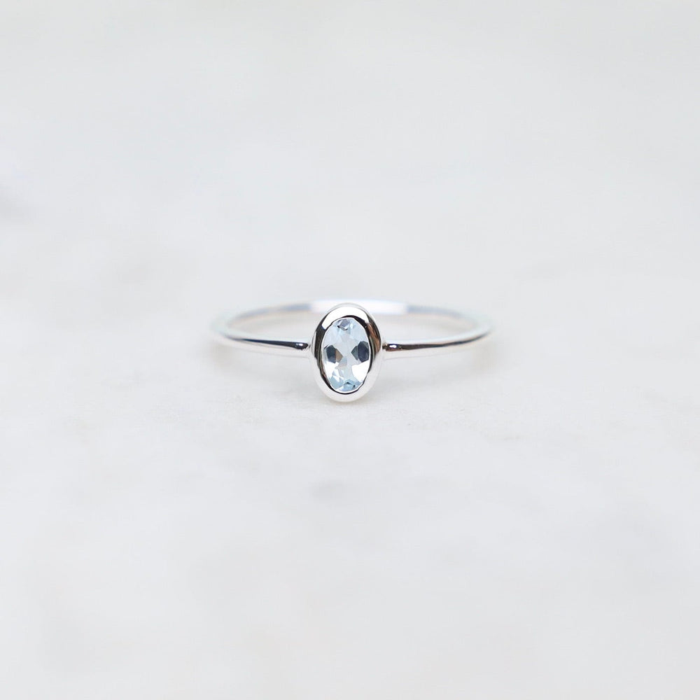 RNG Sterling Silver Oval Bezel Set Aquamarine Ring