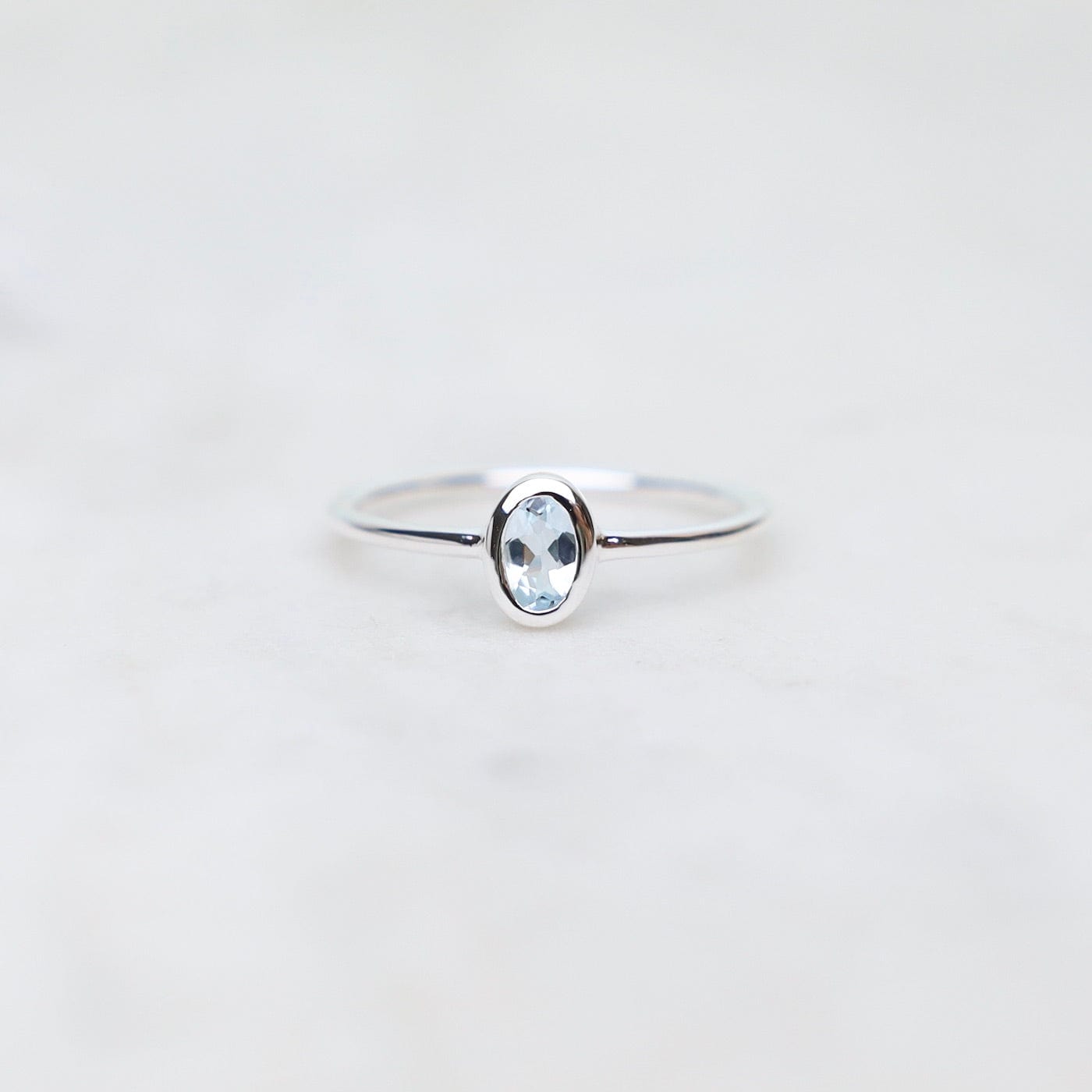 RNG Sterling Silver Oval Bezel Set Aquamarine Ring