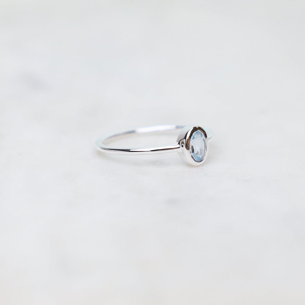 
                  
                    RNG Sterling Silver Oval Bezel Set Aquamarine Ring
                  
                