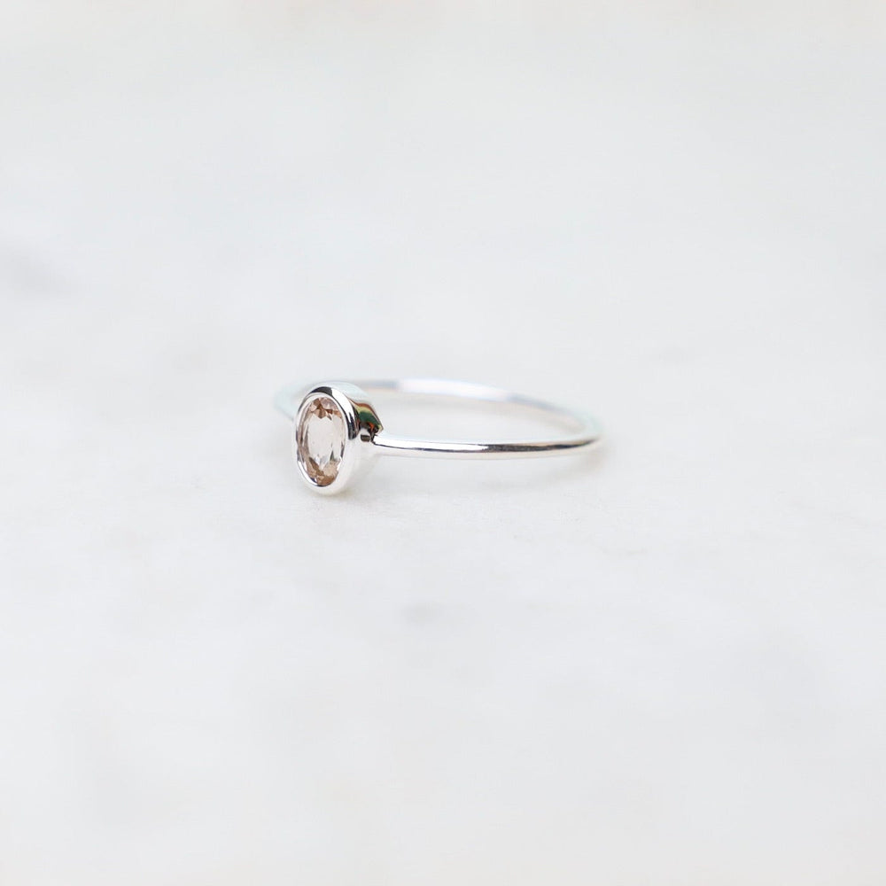 
                  
                    RNG Sterling Silver Oval Bezel Set Morganite Ring
                  
                