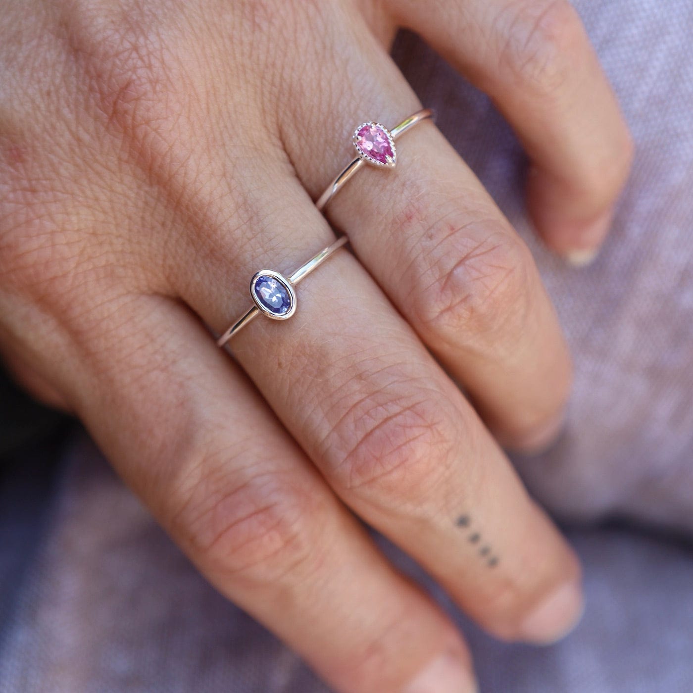 RNG Sterling Silver Oval Bezel Set Tanzanite Ring