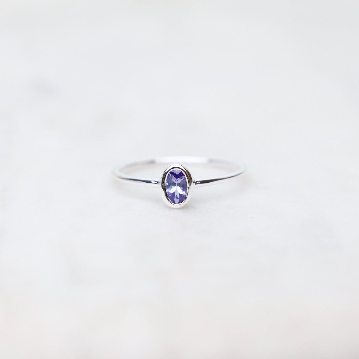 RNG Sterling Silver Oval Bezel Set Tanzanite Ring