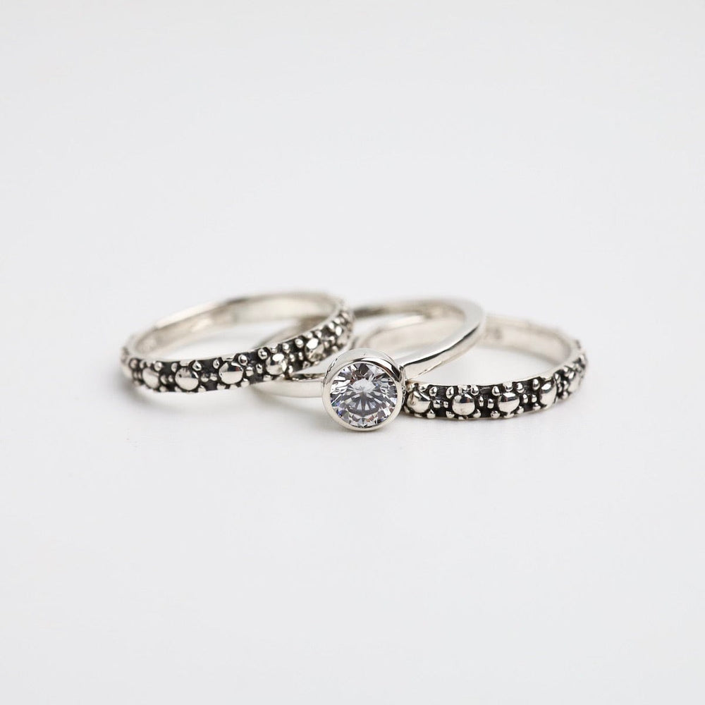 
                  
                    RNG Sterling Silver Oxidized Dot Stacking Ring
                  
                