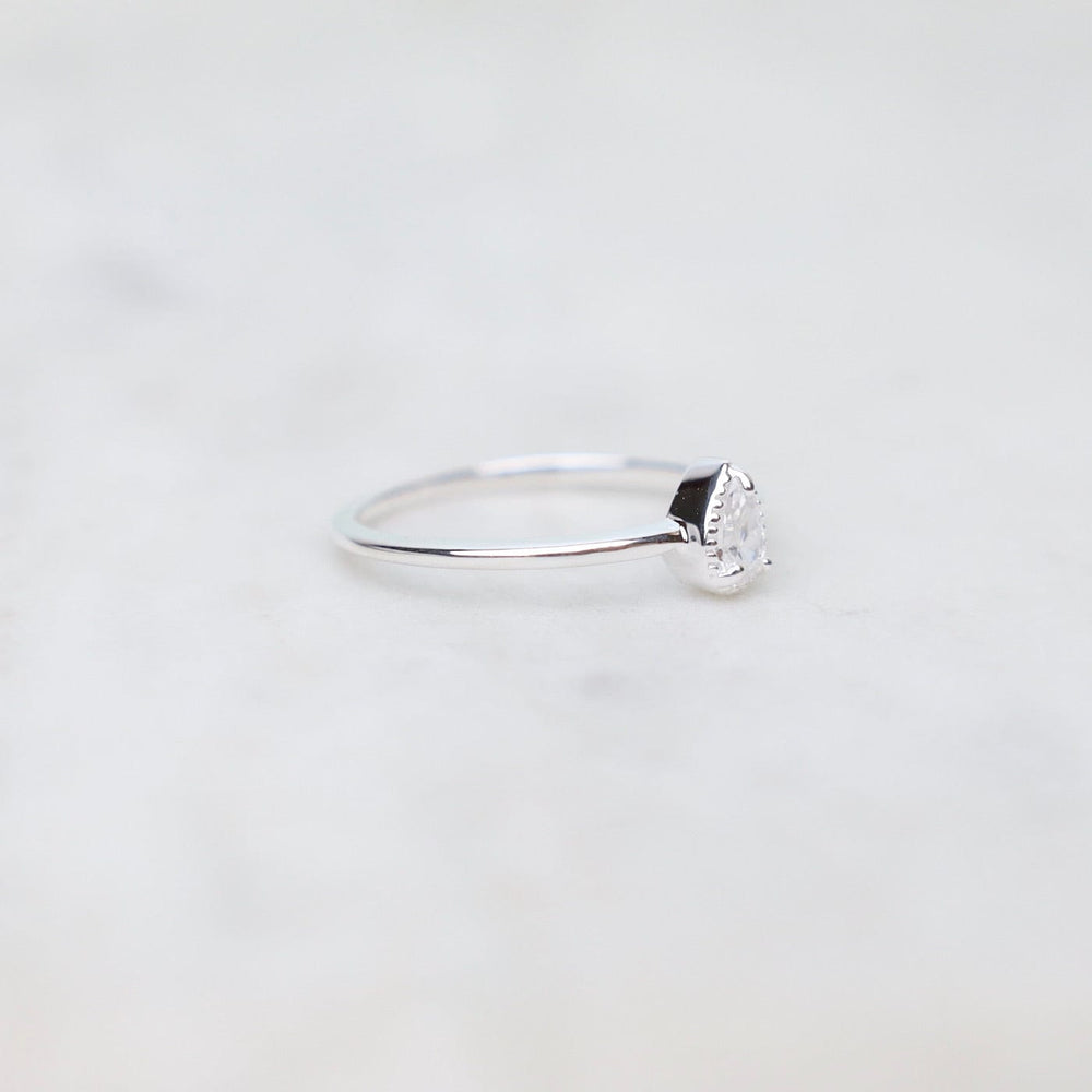 
                  
                    RNG Sterling Silver Pear Cut CZ Milgrain Edge Ring
                  
                