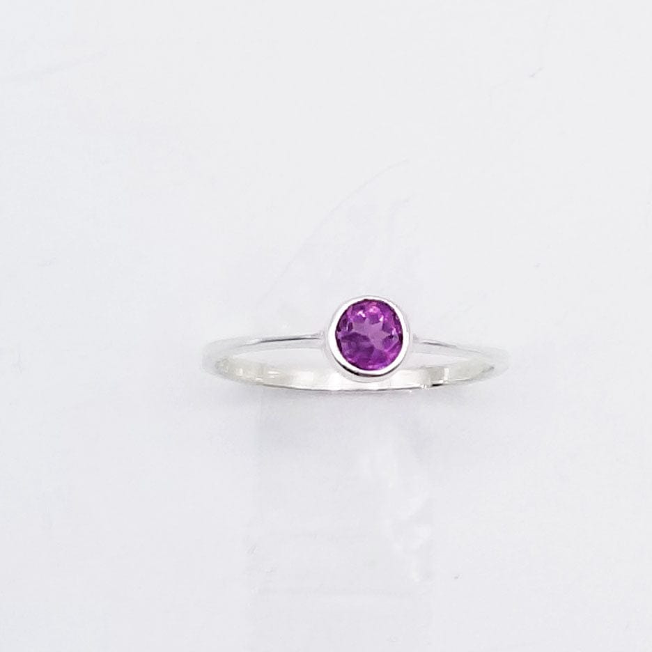 
                  
                    RNG STERLING SILVER RHODOLITE ROUND BEZEL SET RING
                  
                