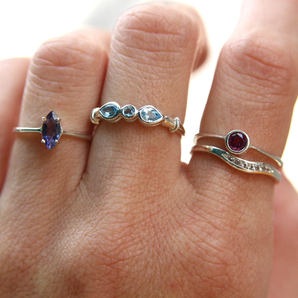 
                      
                        RNG STERLING SILVER RHODOLITE ROUND BEZEL SET RING
                      
                    