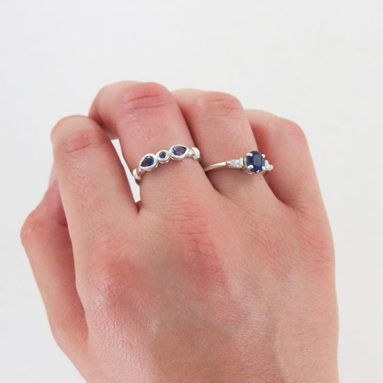 RNG STERLING SILVER RING THREE IOLITE RING