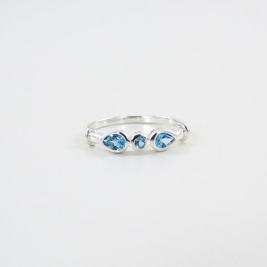 RNG STERLING SILVER RING THREE SWISS BLUE TOPAZ RING