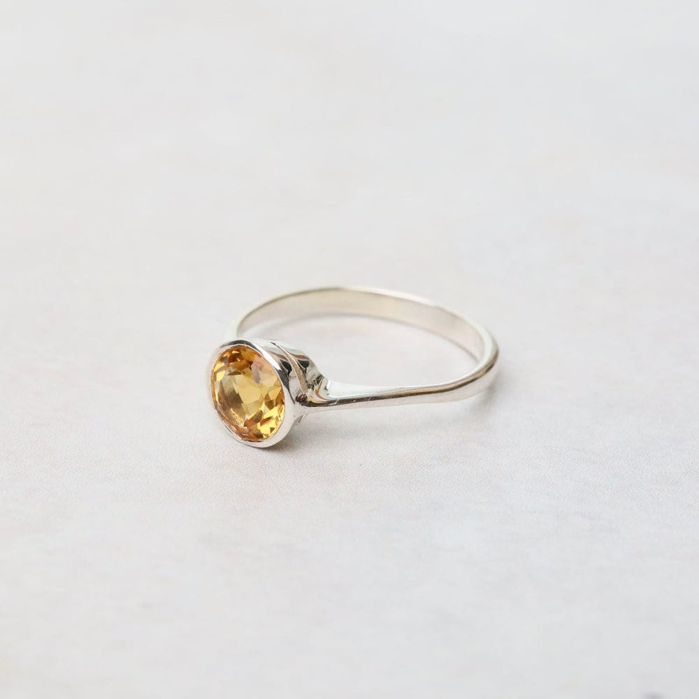 
                  
                    RNG Sterling Silver Ring with 6mm Round Bezel Set Citrine
                  
                