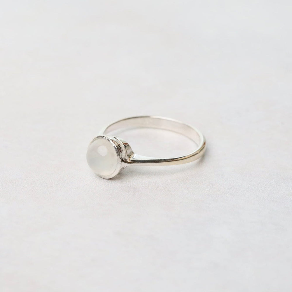 
                      
                        RNG Sterling Silver Ring with 6mm Round Bezel Set Moonstone
                      
                    