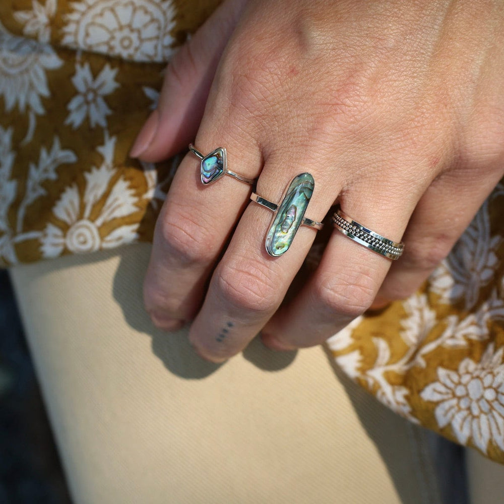 
                  
                    RNG Sterling Silver Ring with Oval Paua Shell
                  
                