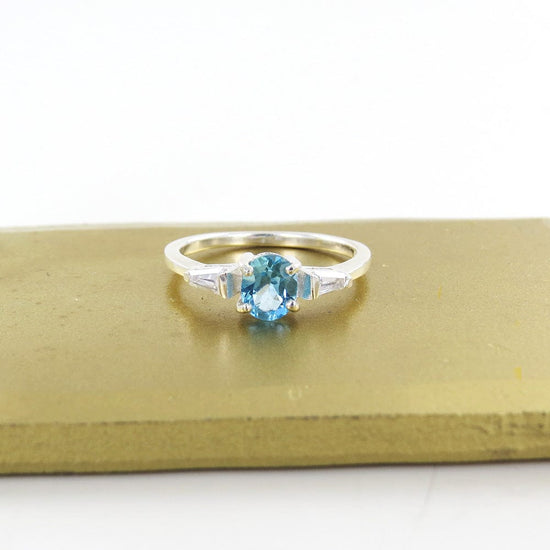 RNG STERLING SILVER RING WITH SWISS BLUE TOPAZ