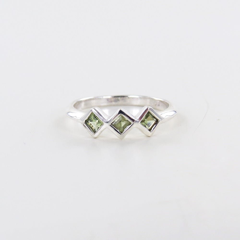 
                      
                        RNG Sterling Silver Ring with Three Peridot Squares
                      
                    