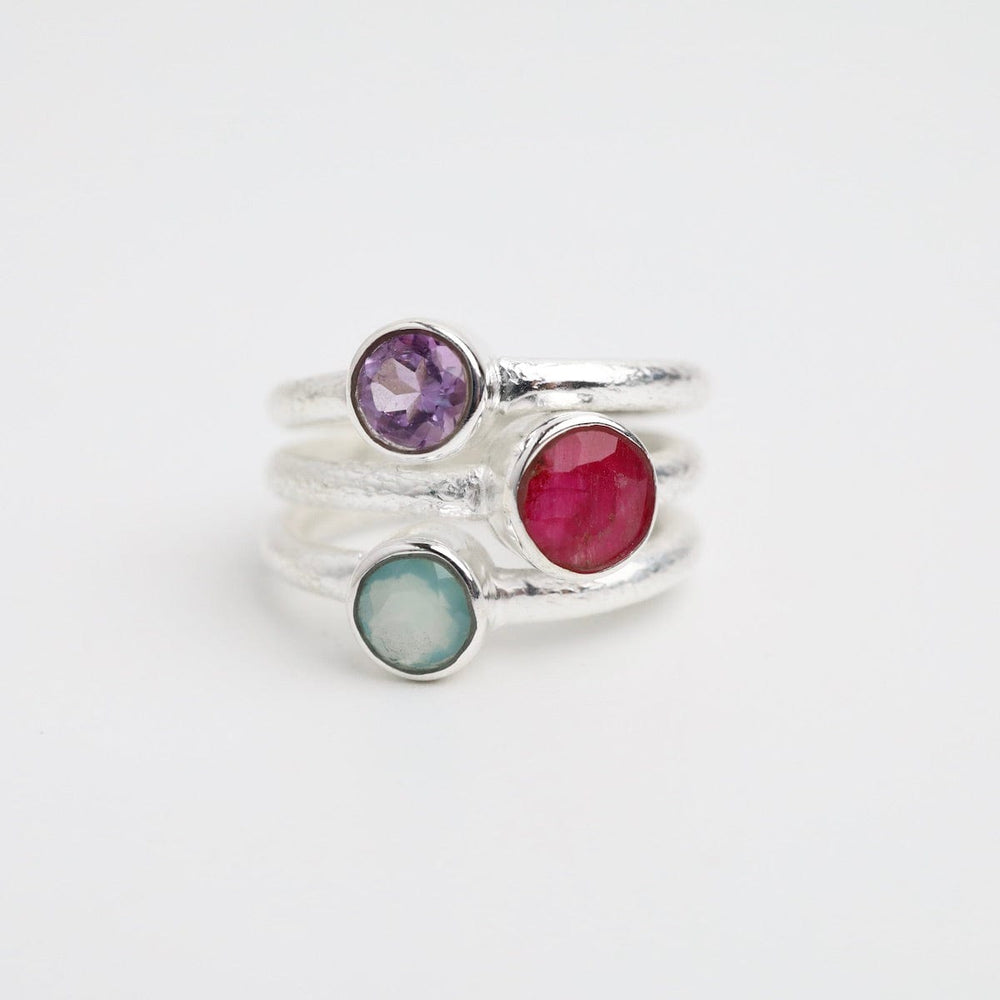 
                      
                        RNG Sterling Silver Ruby Triple Stone Ring
                      
                    