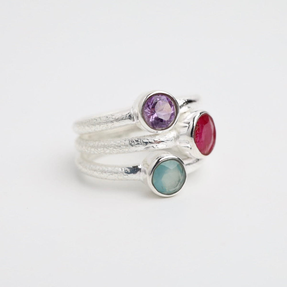 
                      
                        RNG Sterling Silver Ruby Triple Stone Ring
                      
                    