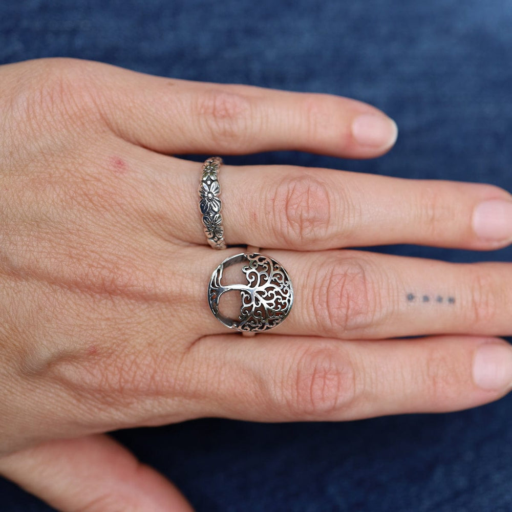 
                  
                    RNG Sterling Silver Stacking Band with 5 Flowers
                  
                