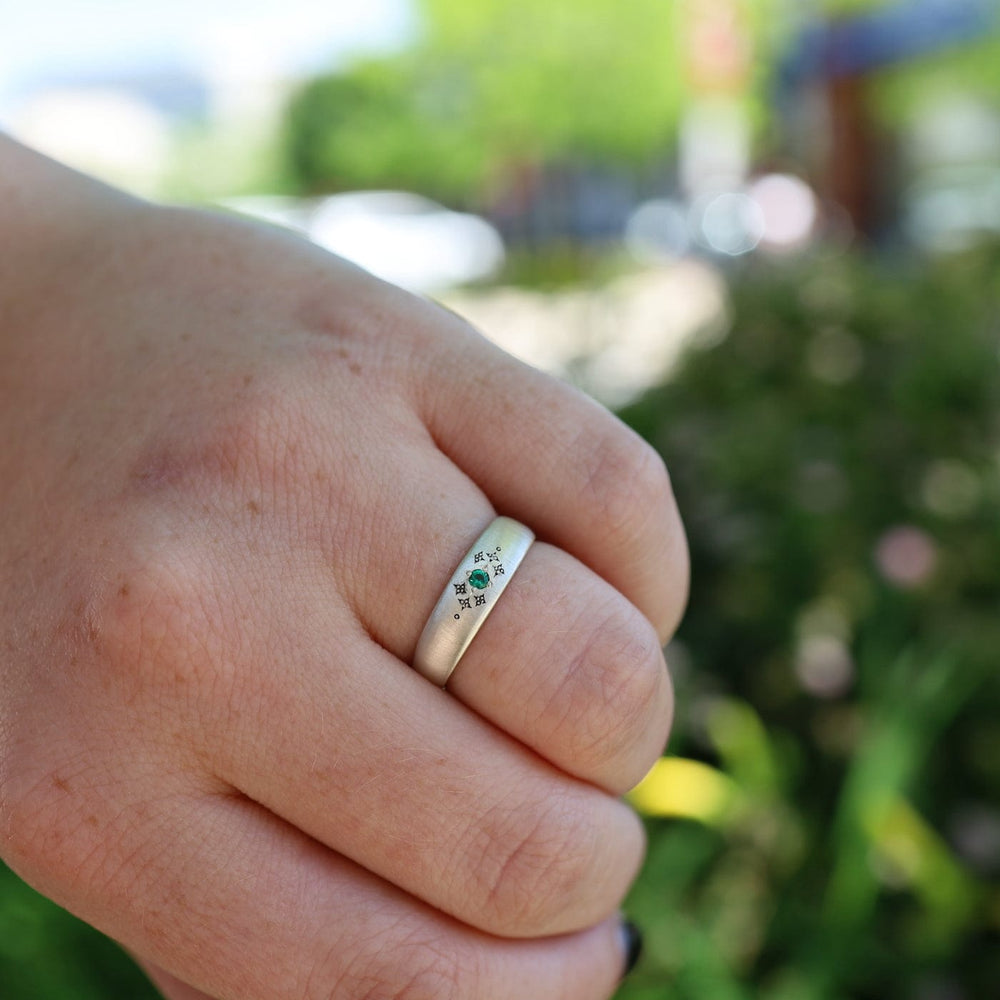 
                      
                        RNG Tapered Silver Moon Band with Etching in Emerald Ring
                      
                    