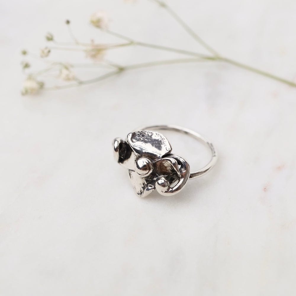 
                      
                        RNG Thin Band Abstract Sterling Silver Flower Ring
                      
                    