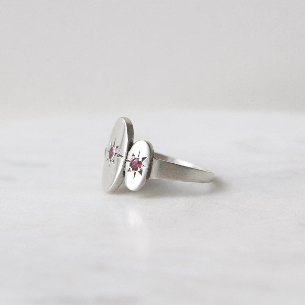 
                      
                        RNG Three Ovals with Star Set Red Garnet Ring
                      
                    