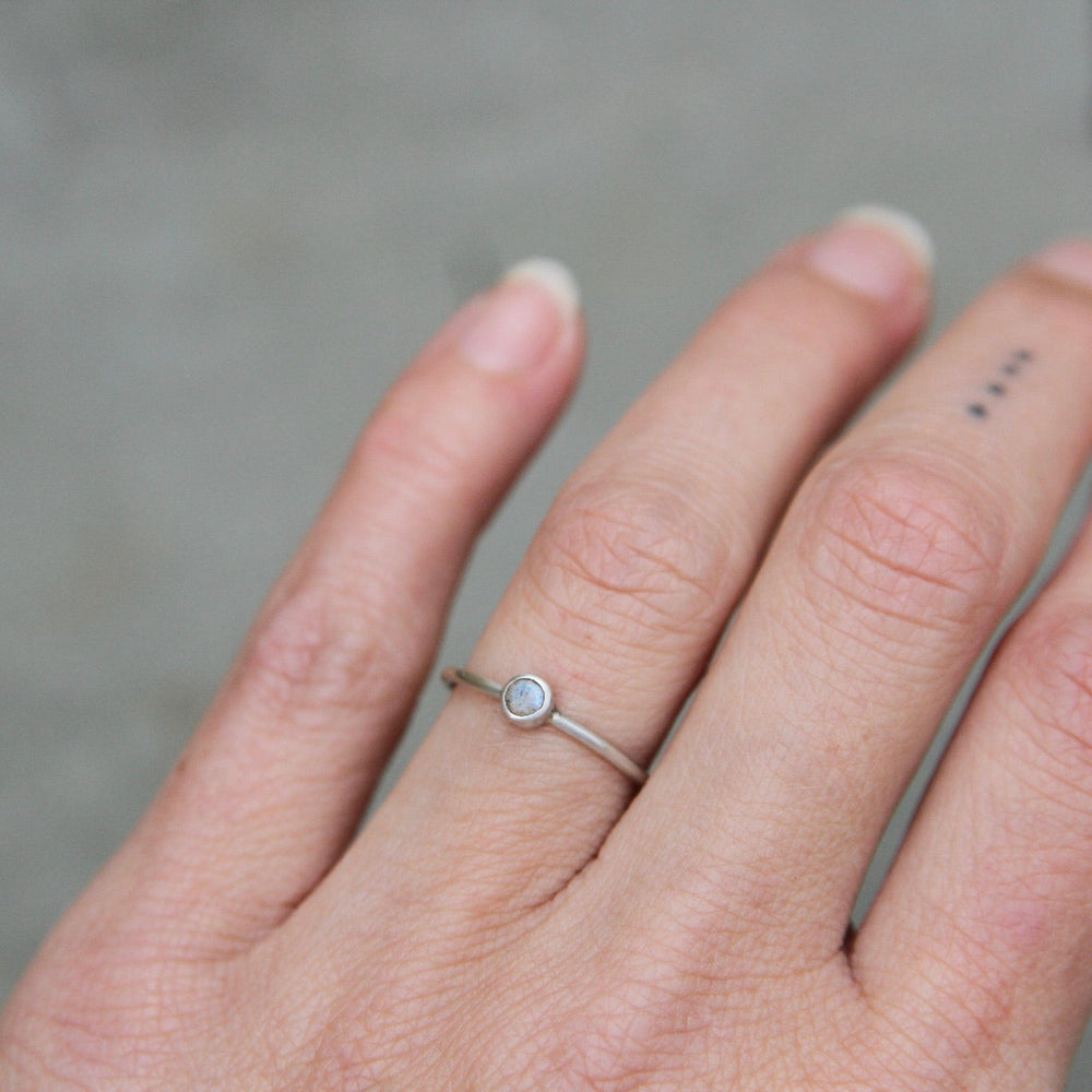 
                      
                        RNG Tiny Faceted Single Rainbow Moonstone in Sterling Ring
                      
                    