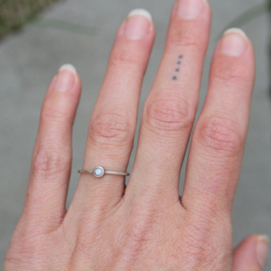 RNG Tiny Faceted Single Rainbow Moonstone in Sterling Ring