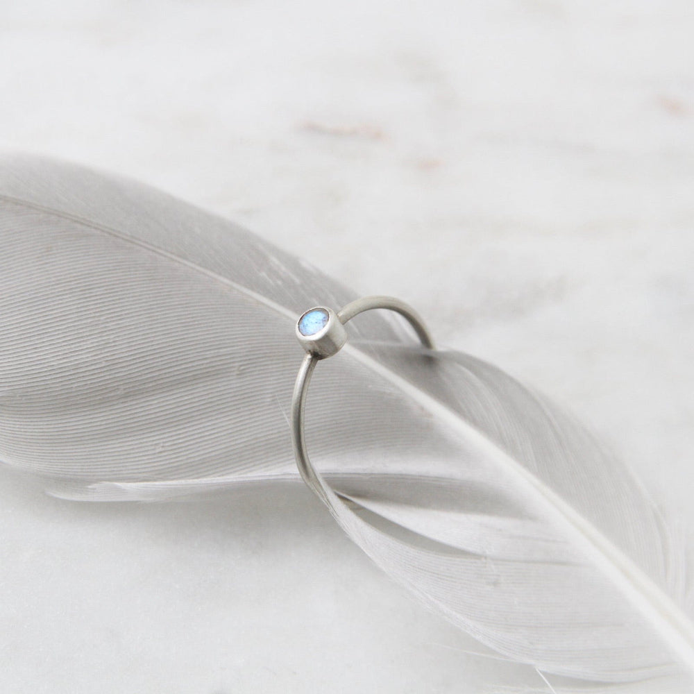 
                      
                        RNG Tiny Faceted Single Rainbow Moonstone in Sterling Ring
                      
                    