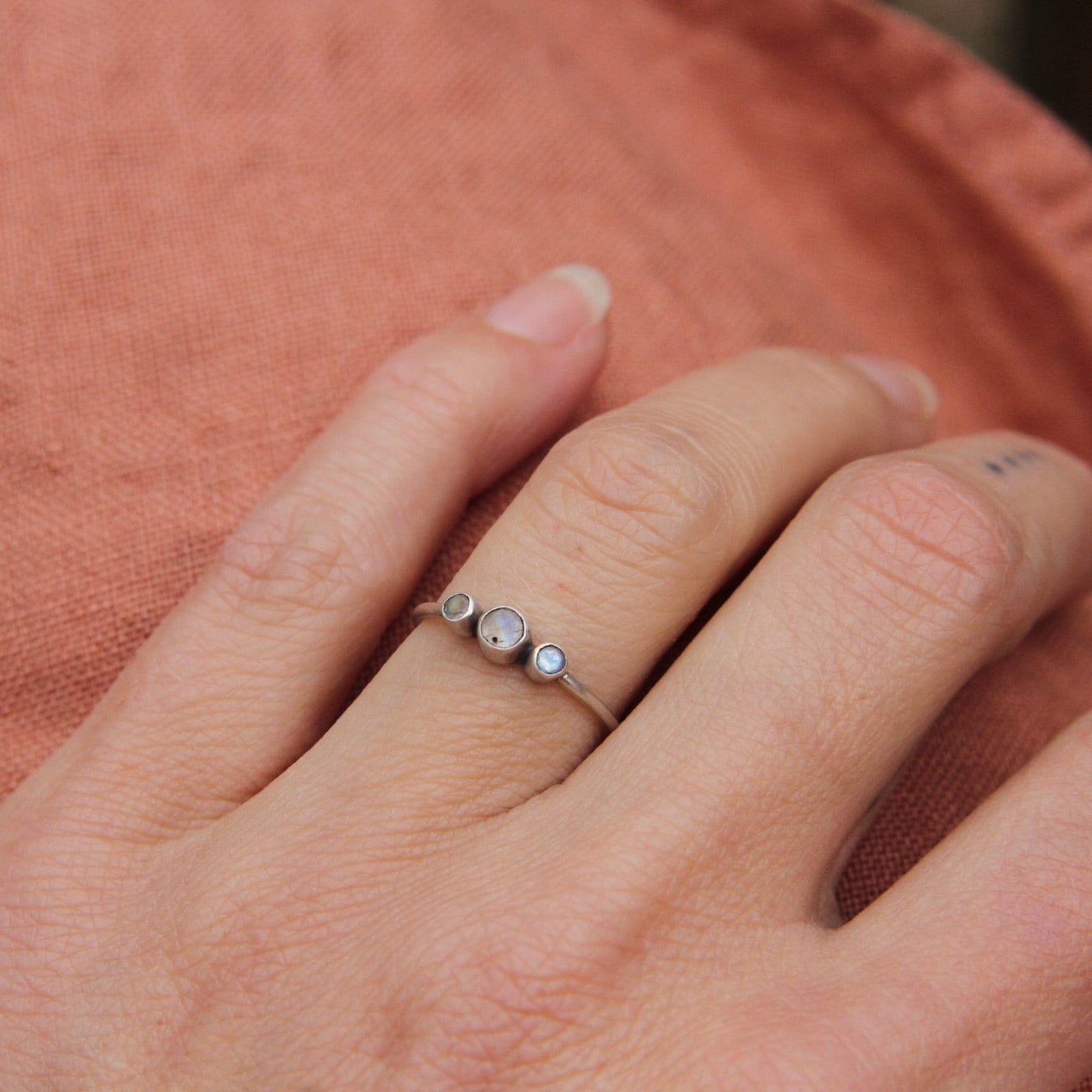 RNG Tiny Graduated Three Rainbow Moonstone in Sterling