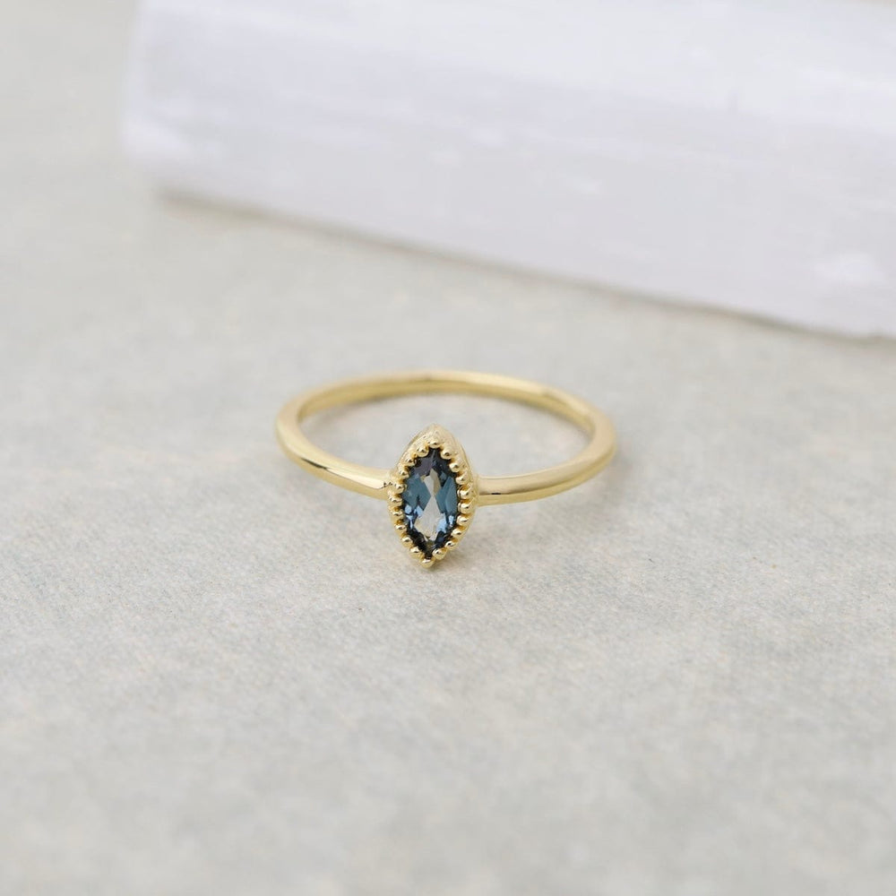 
                  
                    RNG-VERM Gold Vermeil Marquis Cut Milgrain Edge Ring - London Blue Topaz
                  
                