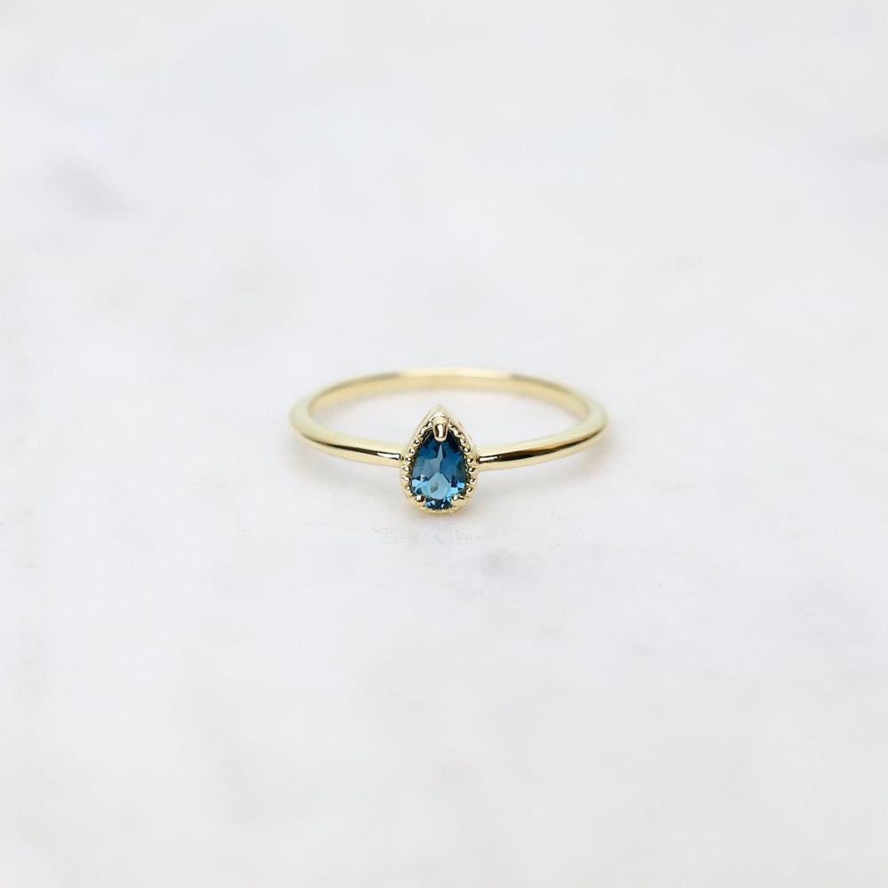 
                      
                        RNG-VERM Gold Vermeil Pear Cut London Blue Topaz Milgrain Edge Ring
                      
                    