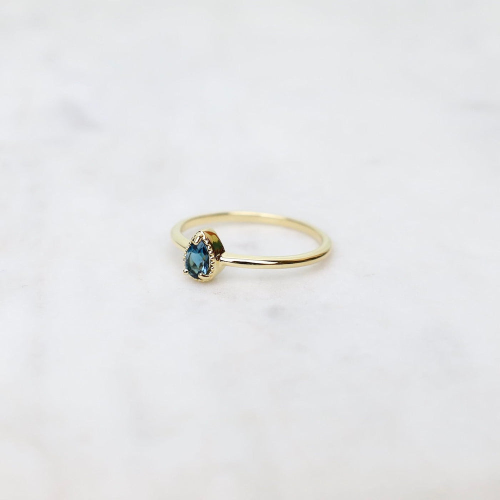 
                      
                        RNG-VERM Gold Vermeil Pear Cut London Blue Topaz Milgrain Edge Ring
                      
                    