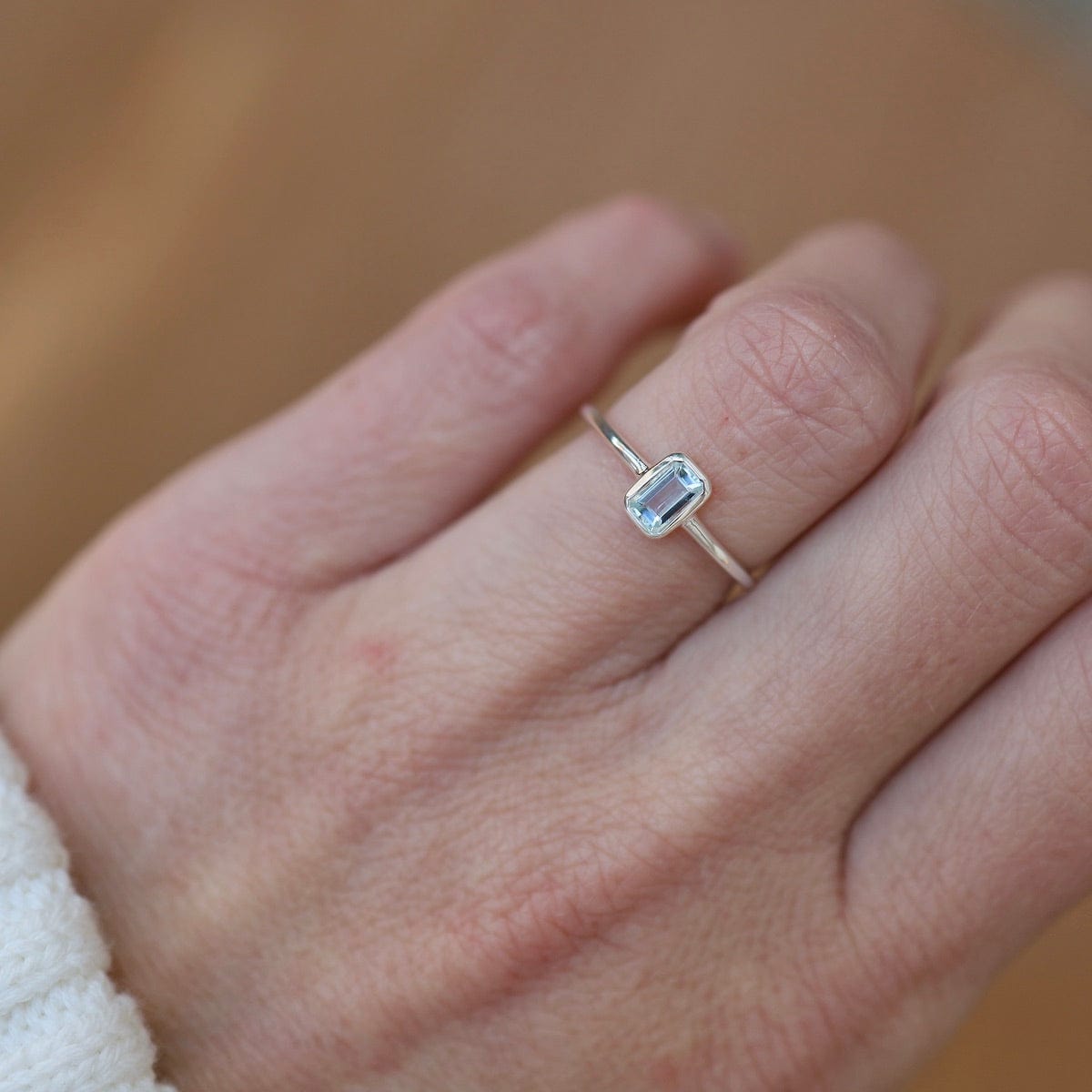 RNG Vertical Bezel Set Emerald Cut Aquamarine Ring