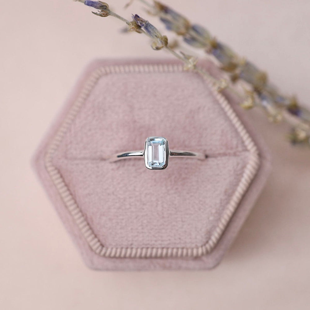 RNG Vertical Bezel Set Emerald Cut Aquamarine Ring