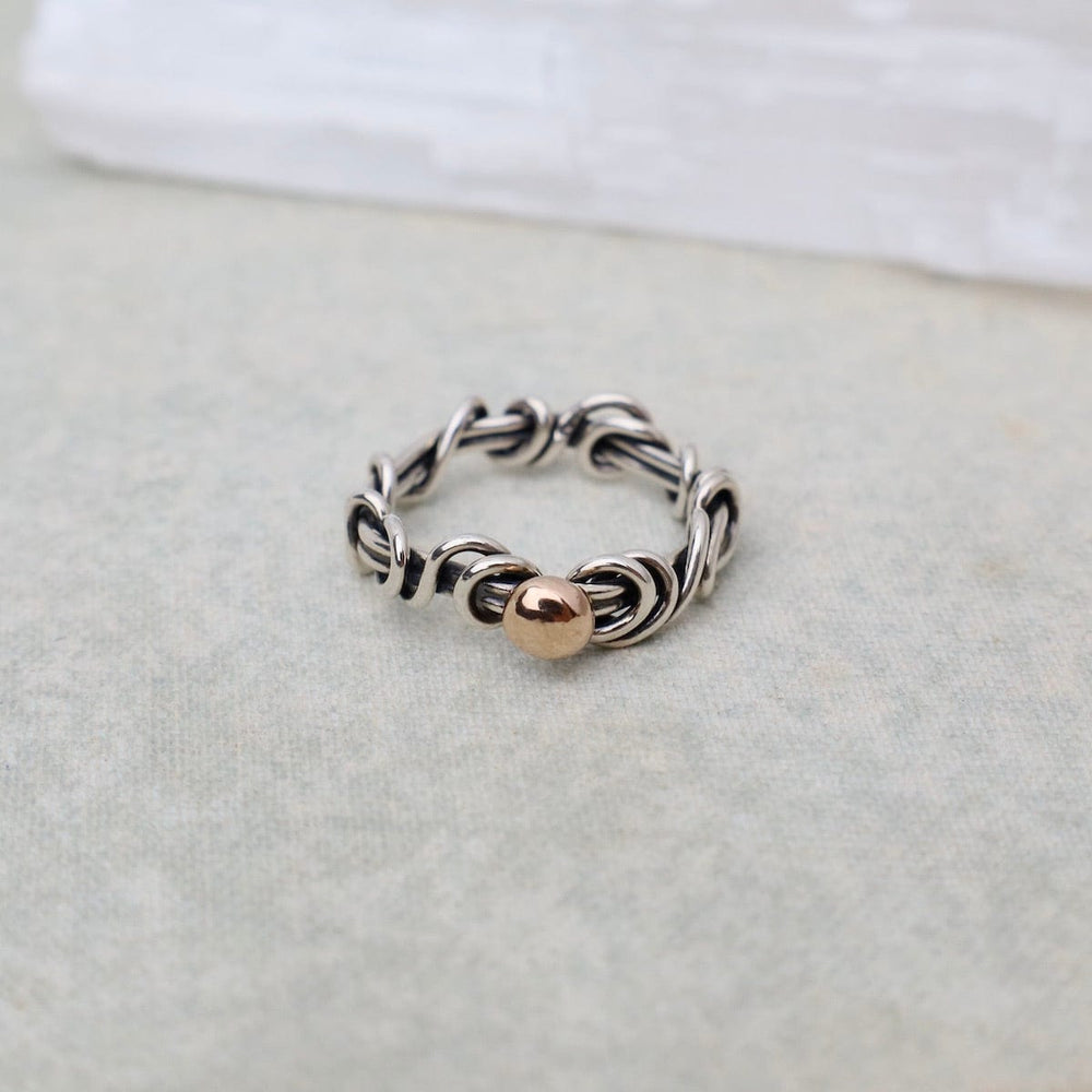 
                      
                        RNG Vine Ring with Rose Gold Accent
                      
                    