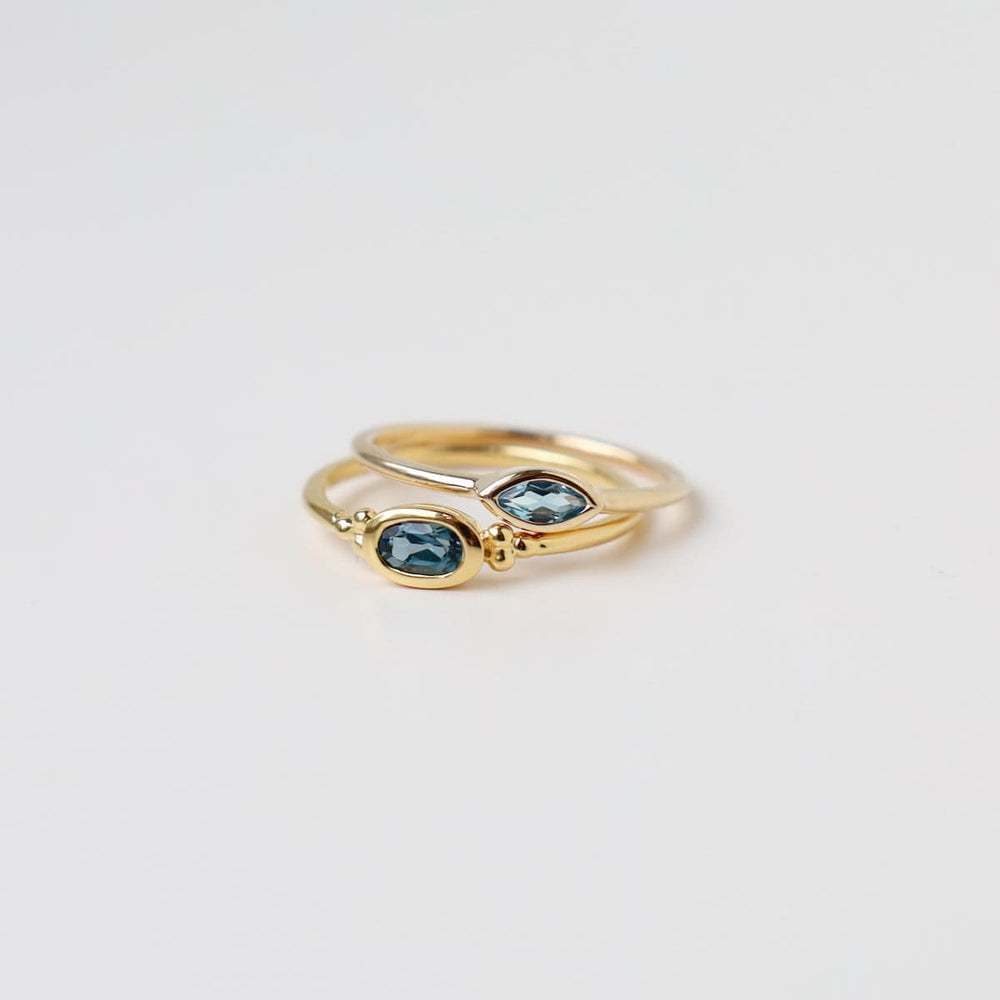 
                      
                        RNG-VRM 14k Gold Vermeil Bezel Set Marquis Blue Topaz Ring
                      
                    