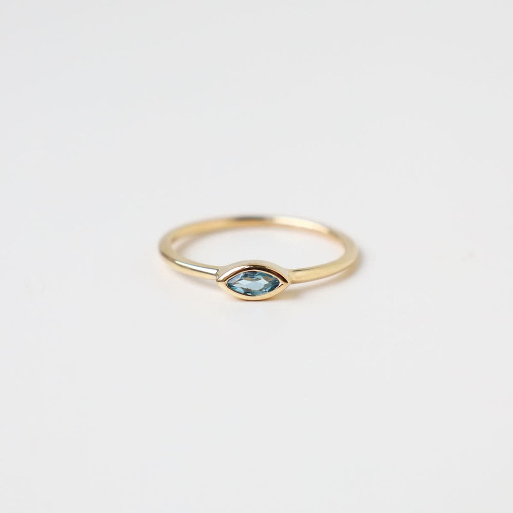 
                      
                        RNG-VRM 14k Gold Vermeil Bezel Set Marquis Blue Topaz Ring
                      
                    