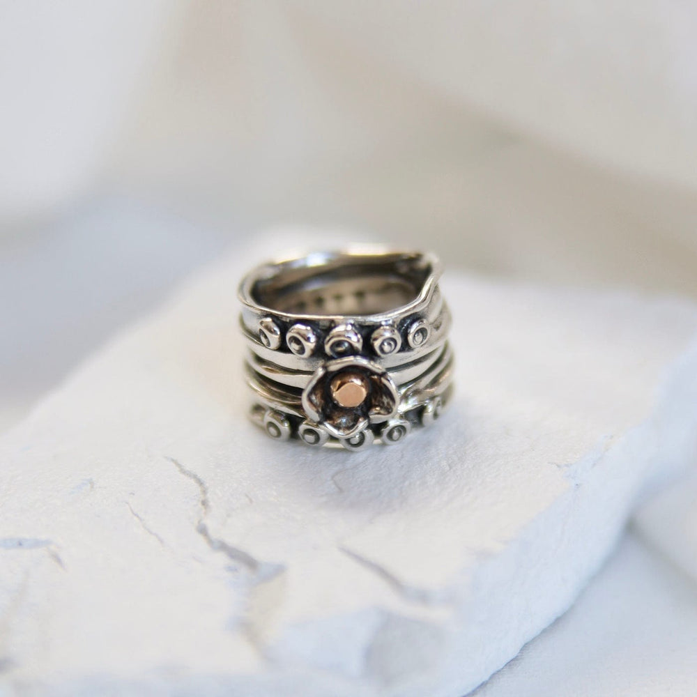 
                  
                    RNG Wide Nordic Ring with Rose Gold Ball in Flower
                  
                