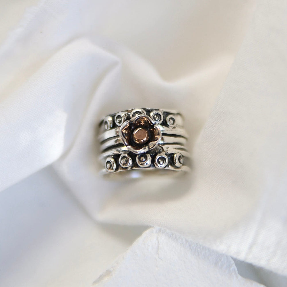 
                  
                    RNG Wide Nordic Ring with Rose Gold Ball in Flower
                  
                