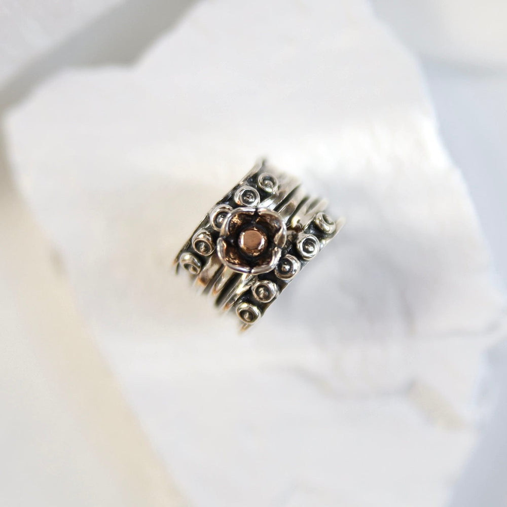 
                  
                    RNG Wide Nordic Ring with Rose Gold Ball in Flower
                  
                