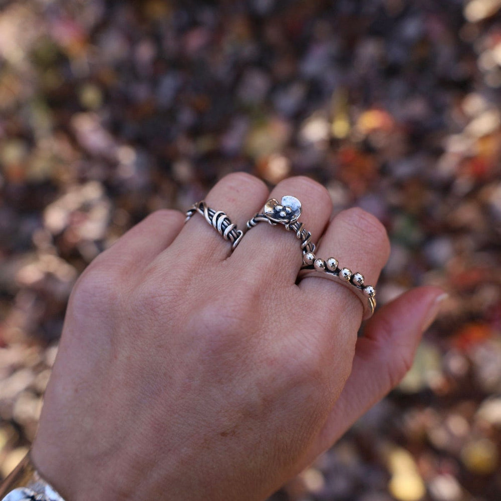 
                      
                        RNG Wrapped Vine Ring with Dogwood Flower
                      
                    