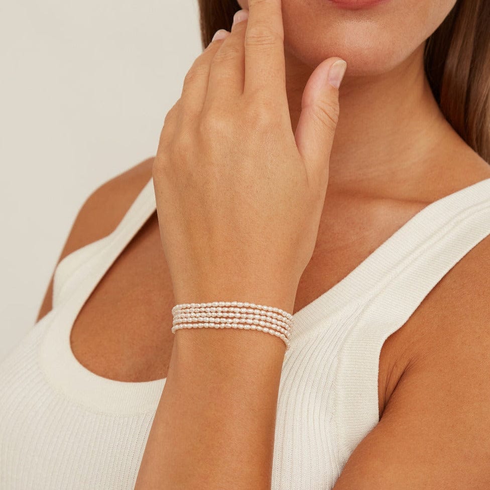 
                      
                        WRP-GPL White Rice Pearl Naked Wrap Bracelet
                      
                    