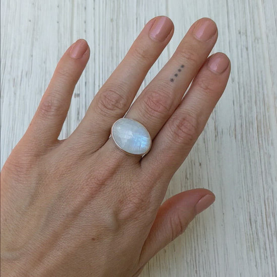 Load and play video in Gallery viewer, Sterling Silver &amp;amp; 14k Rose Gold Ring with Oval Smooth White Rainbow Moonstone
