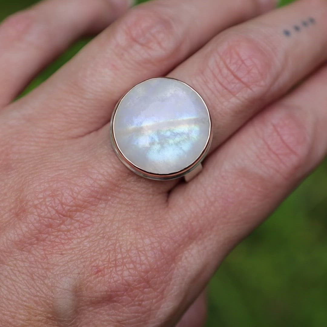 Load and play video in Gallery viewer, Sterling Silver &amp;amp; 14k Rose Gold Ring with Round Smooth White Rainbow Moonstone
