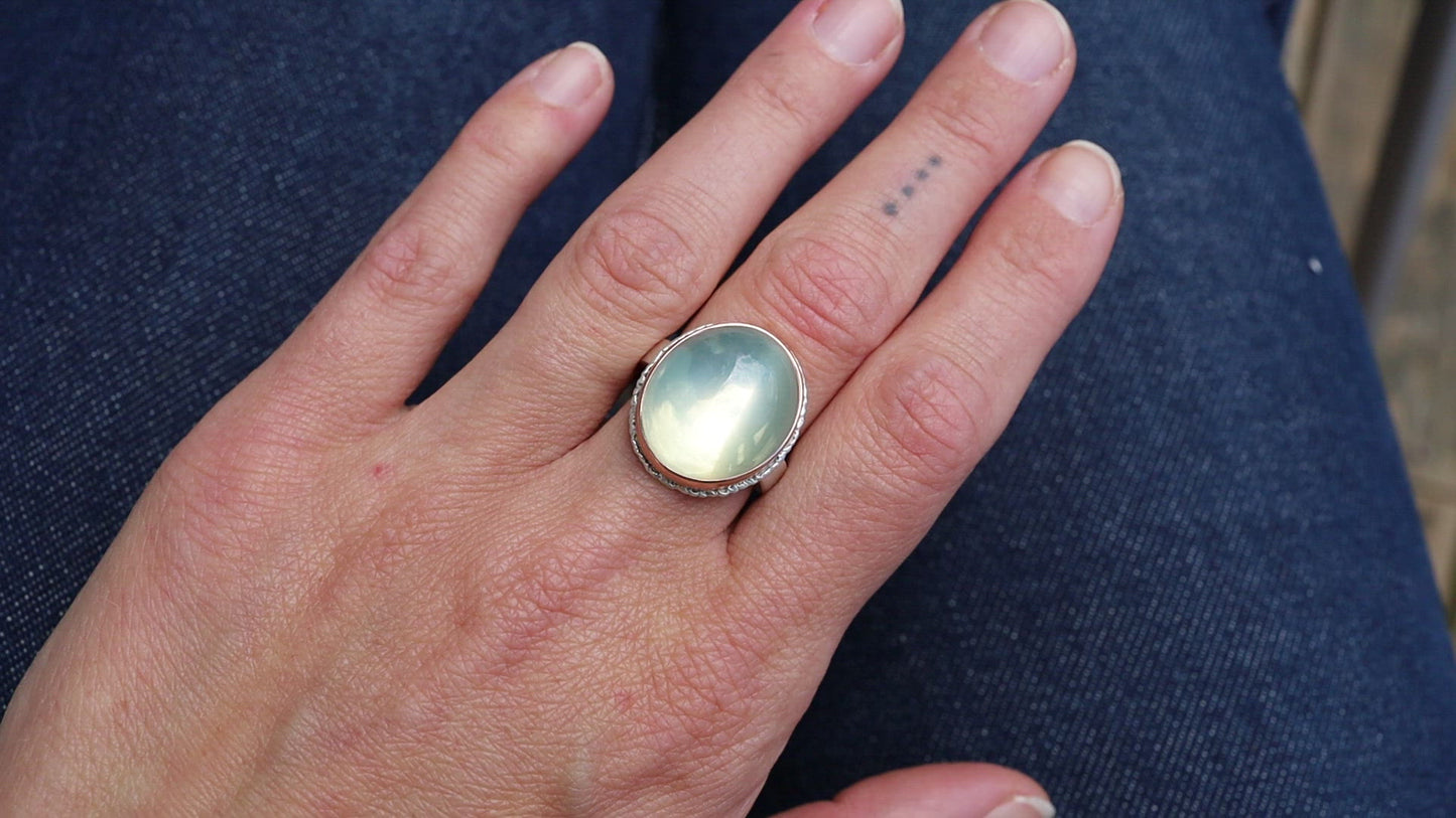 Load and play video in Gallery viewer, Sterling &amp;amp; 14K Rose Gold Ring with Vertical Oval Smooth Green Moonstone

