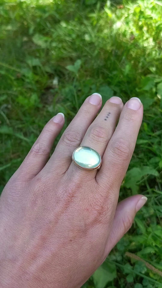 Load and play video in Gallery viewer, Sterling Silver &amp;amp; 14k Rose Gold Ring with Oval Smooth Green Moonstone
